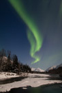 Green Aurora streaks through the night sky over Portage Creek, with Bard Mountain centered low on the horizon.  Portage Valley, AK.  March 7, 2012.